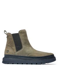 Braune Wildleder Chelsea-Boots mit schwarzen elastischen Seiteneinsätzen, strukturierten Gummisohlen und einer Schlaufe zum Ziehen an der Rückseite. Schlichtes, modernes Design.