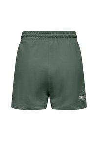 Groene shorts van zacht materiaal met een elastische tailleband. Voorzien van de tekst "ONLY PLAY LIMITLESS EST 1996" in het wit aan de onderlinkerzijde.