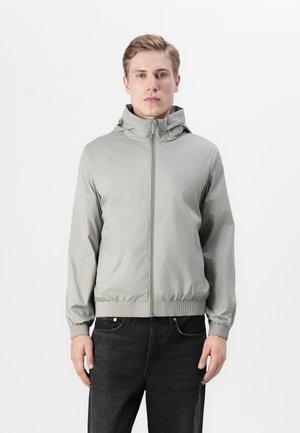 Calvin Klein Vodoodporna jakna - mourning dove
