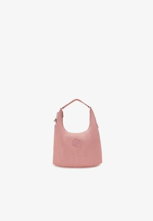 Pink hobo bag made from soft material, featuring a rounded shape, a shoulder strap, and a circular embossed logo detail on the front.