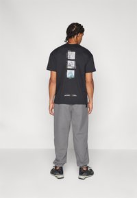 Adidas Terrex NATIONAL GEOGRAPHIC AERO.READY_WARMING PANTS - Āra bikses - grey