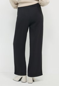 Calliope GYMNASTIQUE - Pantaloni sportivi - noir