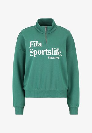 Grüner Sweatshirt mit hohem Kragen, halbem Reißverschluss und langen Ärmeln. Mit weißem "Fila Sportslife"-Text und Detail "Seit 1974".