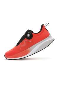 Red athletic shoe with a textured knit upper, black accents, a circular lacing dial, and a thick, white midsole curving into a black outsole.