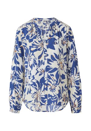 Langsleeve blouse van een witte stof met een gedurfde blauwe bloemenprint en bruine accenten. V-halslijn en een relaxed fit.