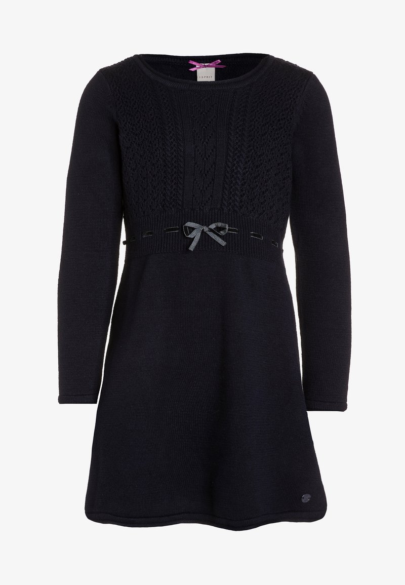 Robe noire à manches longues en maille avec un motif texturé sur la poitrine, un petit nœud gris à la taille et un col rond.