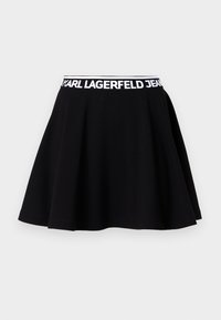 Svarte skjørt med en flagrende design, laget av bomull. Har en hvit elastisk midjebånd med "KARL LAGERFELD JEANS" logo.