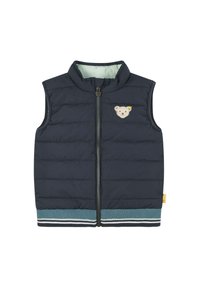 Gilet senza maniche blu navy con zip frontale, design imbottito, orlo a costine in teal con strisce bianche e applicazione di un orso sul petto.