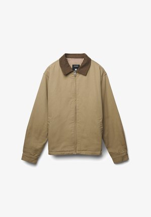 Giacca beige con zip e collare in velluto a coste marrone, maniche lunghe e tasche laterali, presentata su uno sfondo bianco.