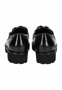 Schwarze Lackleder-Slipper mit glänzender Oberfläche, gerundetem Zehenbereich, dickem Profilsohle, dekorativem Schleifenakzent auf dem Obermaterial und gesteppten Details.