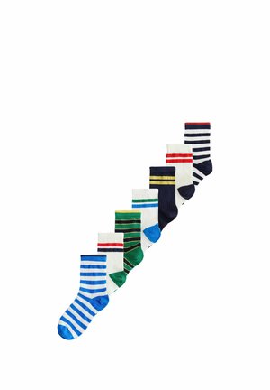 Seven colorful striped socks in various designs, arranged diagonally from smallest to largest on a white background.