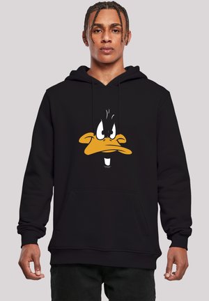 Black hoodie made of fabric featuring a large graphic of a cartoon duck's face in yellow and white, with raised eyebrows and a distinct expression.