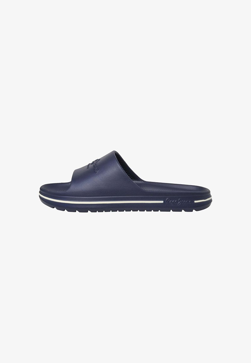 Navy blue slide sandal made of rubber with a textured strap, white accent stripe on the sole, and embossed logo detail on the upper.
