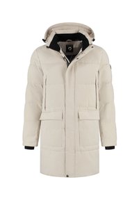 Lange crème gewatteerde winterjas met capuchon, zwarte binnenkraag, voorrits en knoopsluiting, twee klepzakken en twee verticale ritszakken.