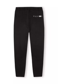 Czarne dresowe spodnie z miękkiego, gładkiego materiału. Posiadają elastyczny pas oraz małą kieszeń na zamek z tyłu z subtelnym detalem logo.