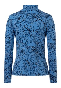 Haut bleu à manches longues avec un imprimé floral noir, col montant, coupe ajustée et texture douce. Idéal pour une tenue décontractée.