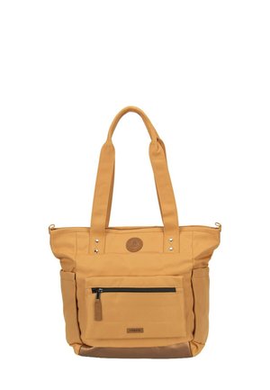 Beigefarbene Tragetasche mit zwei Schulterriemen, vordere Reißverschlusstasche, Seitentaschen und einem kleinen runden Logopatch über der Tasche.