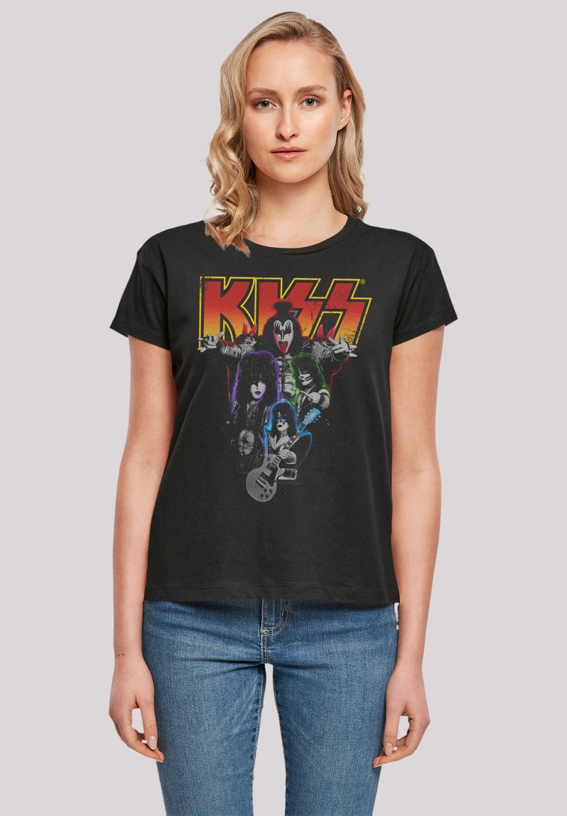 Black cotton t-shirt featuring a vintage-style KISS graphic with bold colors and band member illustrations. Soft, short-sleeved design.