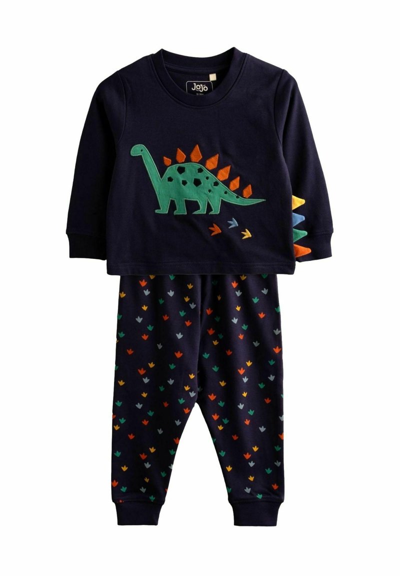 Marineblauw pyjama set van twee delen met een longsleeve top met een groene dinosaurus en oranje stekels, gecombineerd met een broek met een patroon van multicolor motieven.