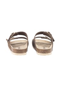 Sandalias de ante marrón con dos correas ajustables, plantilla texturizada, suela de corcho y suela exterior de goma blanca; diseño minimalista sin adornos.