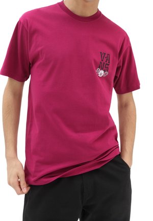 T-shirt en coton bordeaux à manches courtes avec un motif graphique noir et floral sur le côté gauche de la poitrine. Col rond avec une coupe décontractée.