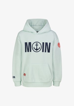 Light mint green hoodie with large navy "MOIN" text and anchor symbol on front, kangaroo pocket, and red circular patch on left sleeve.