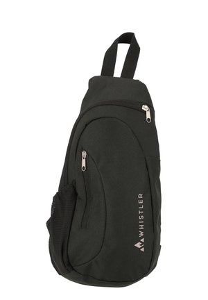 Svart tygryggsäck med en slank design, som har två zippered fickor, en sidoficka i mesh och ett bärhandtag högst upp för enkel transport.
