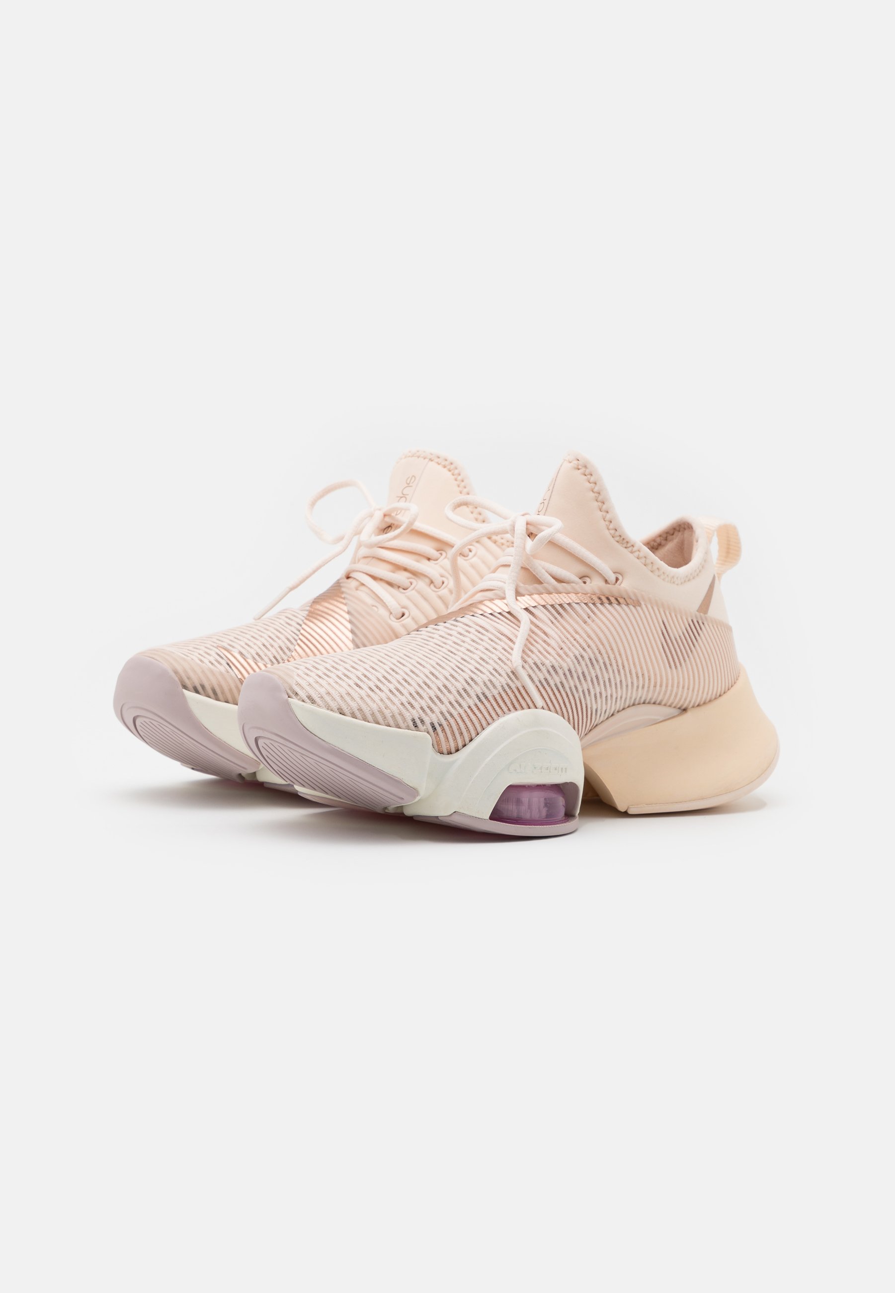 nike training air zoom superrep trainers in peach