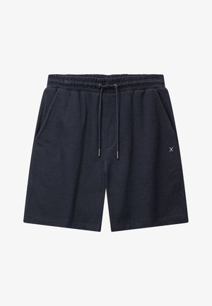 Pantaloncini da uomo blu navy realizzati in tessuto morbido, con cintura elastica e coulisse, e due tasche laterali. Design minimalista.