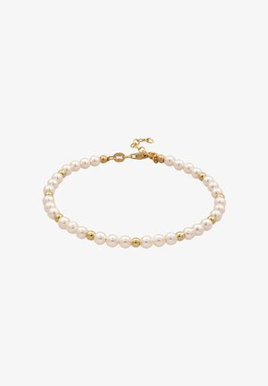 Gold- und Perlenarmband mit abwechselnden weißen Perlen und goldenen Perlenakzenten. Gesichert mit Karabinerverschluss und verstellbarer Kette.