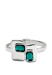 Anillo de plata con dos piedras preciosas rectangulares de color verde azulado. El diseño incluye superficies lisas y pulidas y una forma moderna y geométrica.