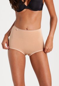 High-waisted beige panties made of smooth, stretchy fabric with a soft waistband and minimal stitching for seamless wear.
