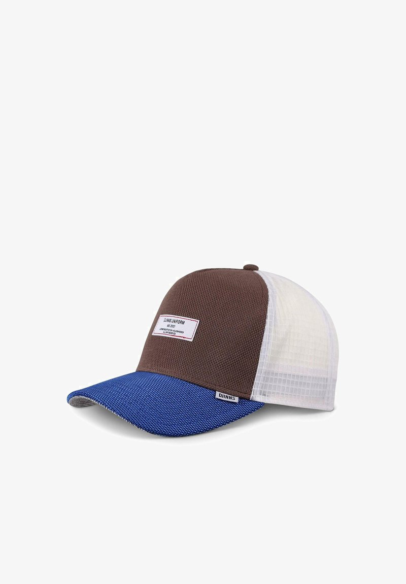 Brown mesh baseball cap with a blue bill. Features a white back panel and a tag on the front. Texture varies between panels.