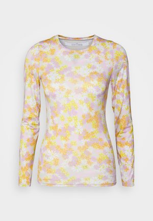 Camisa de manga longa em um tecido leve e elástico, com um padrão floral em cores suaves de rosa, amarelo e branco.