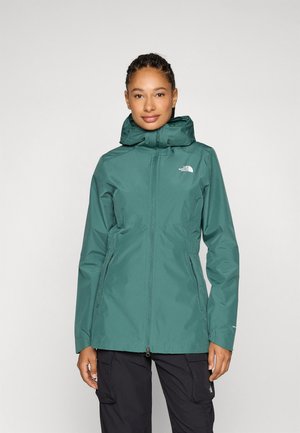 Teal waterproof jacket with a hood, zip closure, and two side pockets. Features a logo on the chest and a sleek, fitted design.