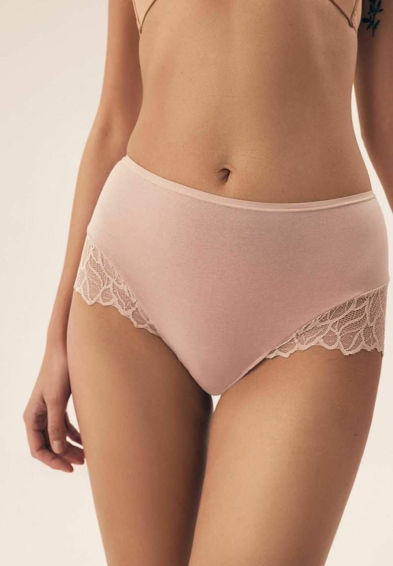 High-waisted panties in soft pink cotton with delicate lace trim along the sides, featuring a smooth waistband and a slightly shiny finish.