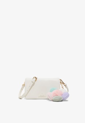 White rectangular crossbody bag with adjustable strap and pastel-colored fluffy pom-pom keychain attached to side.
