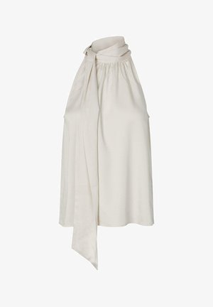 Krämfärgad ärmlös blus med knytkrage, rynkad halsringning och slätt tyg. Har en lös, flödande silhuett.