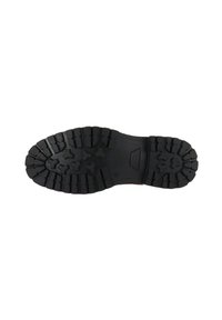 Zwarte rubberen schoenen met een robuust profiel, voorzien van stervormige uithollingen, een platte hak en gladde randen voor duurzaamheid en grip.