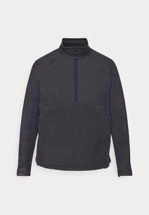 Fleece pullover in dark gray with a high collar, half-zip front, and raglan sleeves. Features side pockets and subtle branding on the chest.
