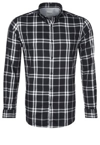 Långärmad skjorta med knappar i ett svartvitt rutmönster, med klassisk krage och diskreta knapppdetaljer.