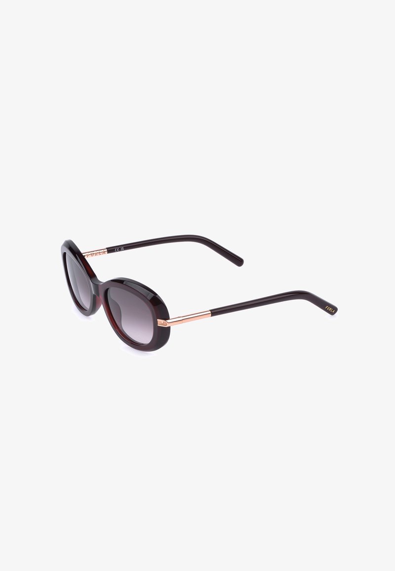 Lunettes de soleil rondes en écaille foncée avec verres dégradés et fines touches métalliques en or rose sur les branches, marquage Furla sur les embouts.