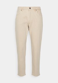 Béžové bavlněné kalhoty s úzkým střihem, pětiprstým designem, zapínáním na zip a jedním knoflíkem. Rovné lemy a minimální šití.