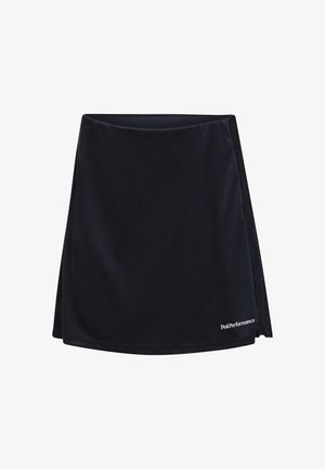 Black athletic skirt with subtle side slit and small white "Peak Performance" logo near hem on right side.