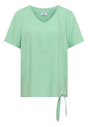 Jasnozielona bluzka z krótkim rękawem, dekoltem w serek i wiązanym detalem po boku u dołu.