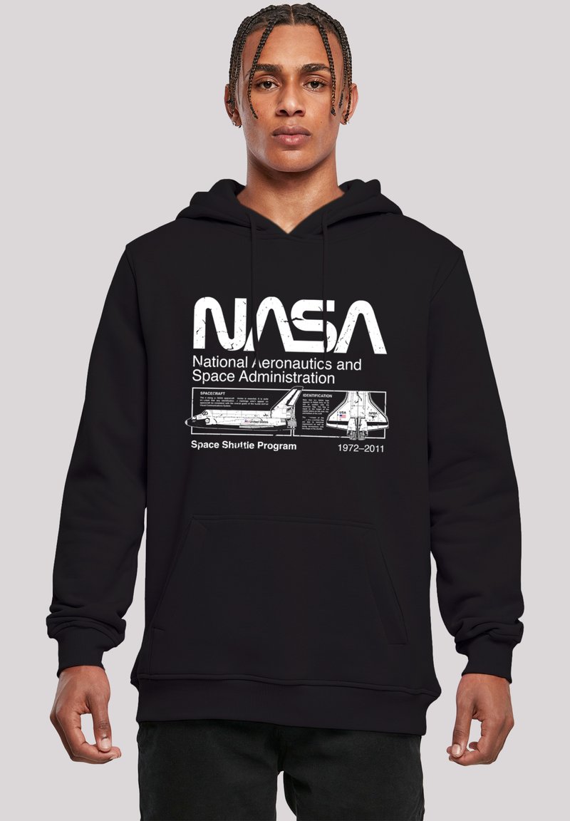 Black hoodie featuring white NASA graphics, including "National Aeronautics and Space Administration" and a Space Shuttle design with dates 1972-2011.
