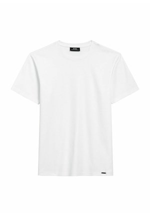 Biała bawełniana koszulka z krótkim rękawem i okrągłym dekoltem. Posiada małą metkę z logo na dolnym brzegu. Prosty i klasyczny design.