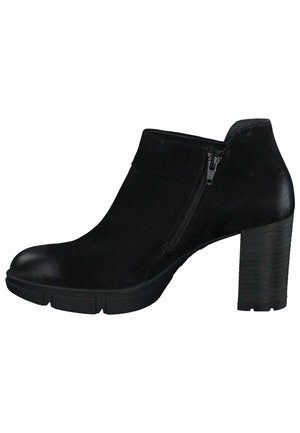 Bottines noires à bout rond, fermeture éclair sur le côté, tige en cuir lisse et talon bloc texturé.