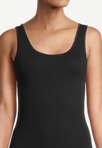 Black tank top with a scoop neckline, made from stretchy, smooth fabric. Features thin straps and a close-fitting design. No patterns or accents.