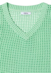 Pull vert clair ajouré col en V avec col côtelé et étiquette de marque "CECIL" à l'intérieur de l'encolure.